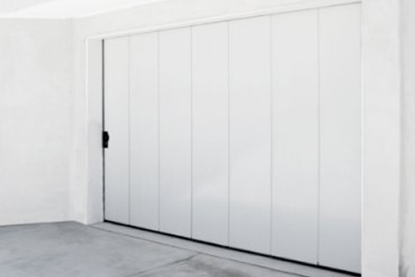 lateral header - Puerta de garaje automática seccional corredera lateral